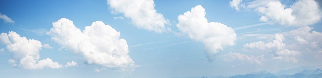 Man on mountain breathing clean air